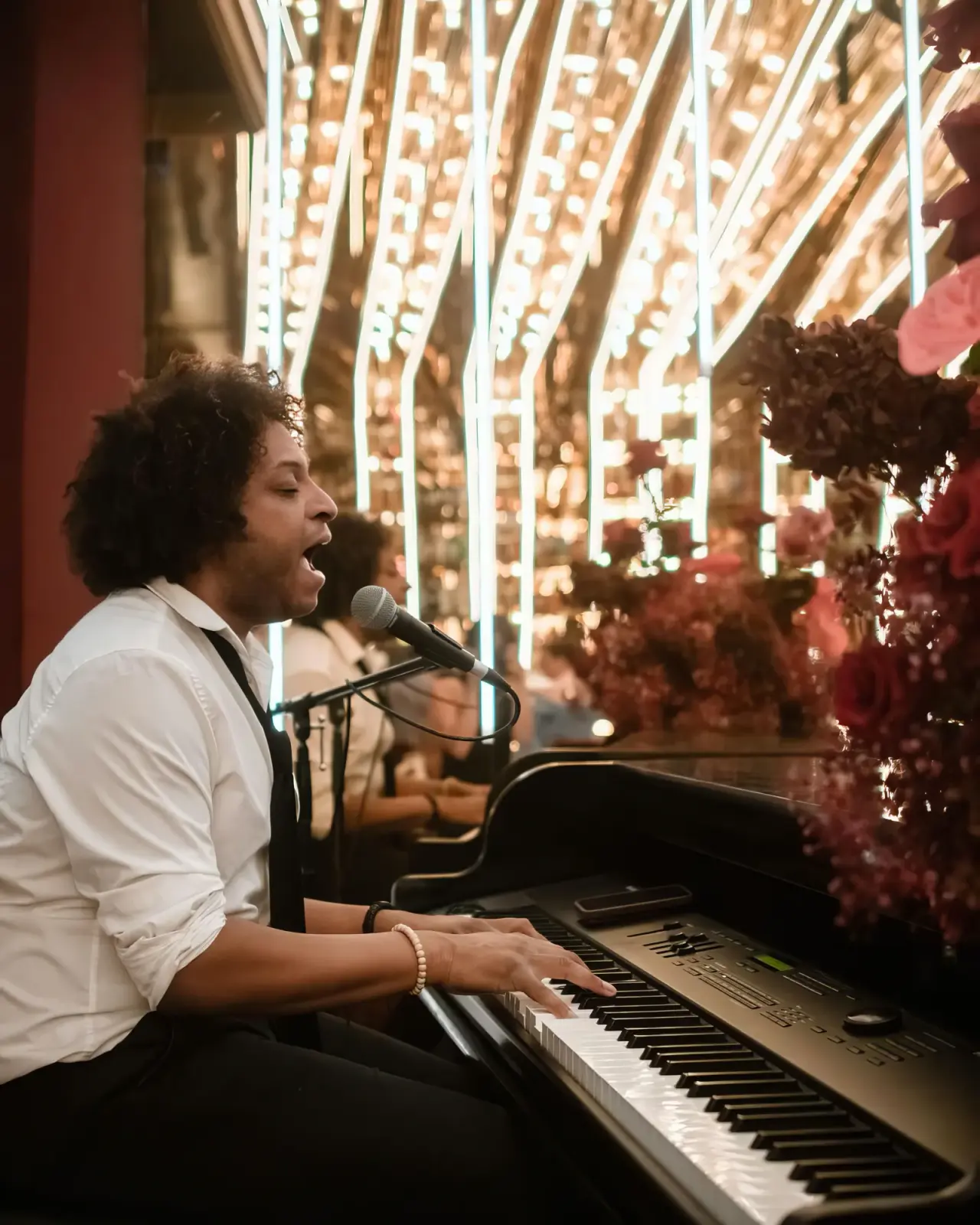 A singer at the piano